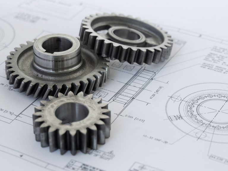 A group of three gear lean on a project